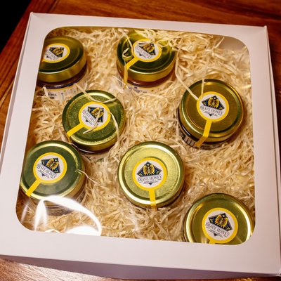 Paper gift packaging with hay filling